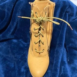 Madden girl bootie! runs 1/2 size small so if you were a 8.5 fits good